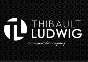 Logo Thibault Ludwig. Texte: Communication agency. Lettres "TL" stylisées